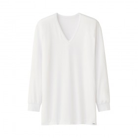 Le T-Shirt Heattech col V Uniqlo.